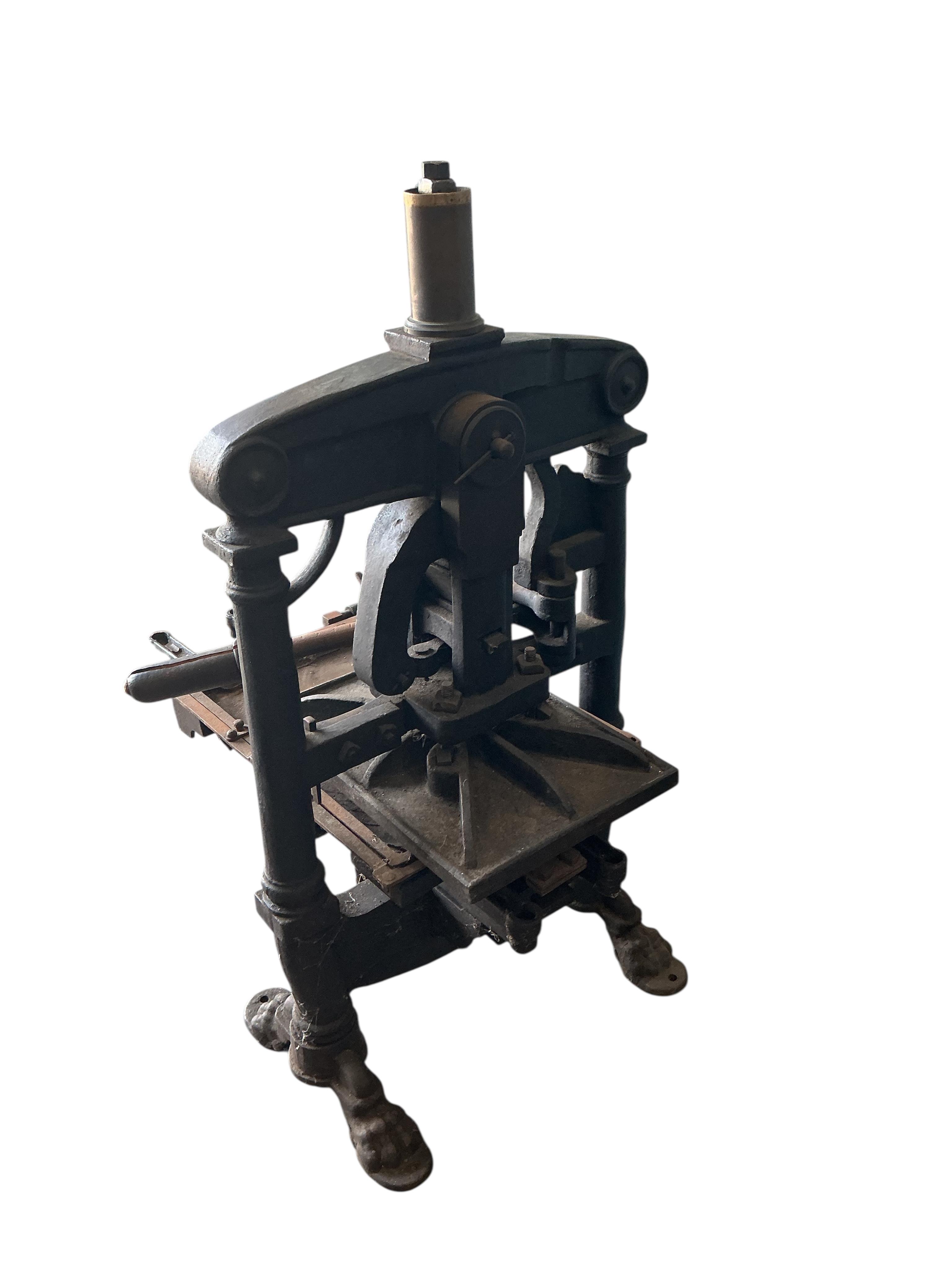 A large Victorian Albion cast iron printing press (for restoration),dated 1851, width 88cm, height 100cm. Provenance: This was the property of the printmaker and designer Jeffery Matthews.